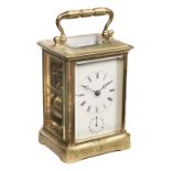 Carriage Clock. A late 19th century brass carriage clock
