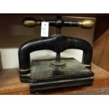 Book press. A cast iron book press