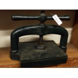 Book press. A cast iron book press