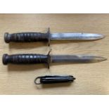 Fighting Knife. An American M-3 Utica fighting knife and two other knives