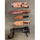 Knives. An American hunting knife plus others