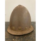 Armour. A copy of a 16th century cabaset steel helmet