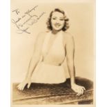 Blondell (Joan, 1906-1979). A vintage signed and inscribed sepia photograph