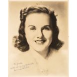 Durbin (Deanna, 1921-2013). A vintage signed and inscribed sepia photograph