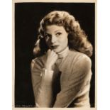 Hayworth (Rita, 1918-1987). A vintage signed and inscribed glossy photograph
