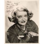 Davis (Bette, 1908-1989). A signed and inscribed glossy photograph