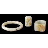 Jade. A Chinese jade archers ring, bangle and toggle