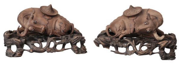 Water Buffaloes. Pair of early 20th century Chinese carved wood water buffaloes