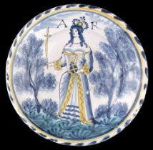 Bristol Delft. A rare Queen Anne delft charger probably Bristol circa 1705-1710