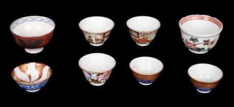 Teawares. A group of teacups made at the kiln of Eiraku in Kyoto area, 19th century