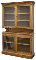 Bookcase. A Victorian bird's eye maple bookcase