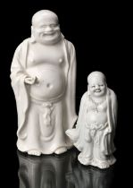 Buddha. Two 18th century white glazed (The Laughing Buddha) statues