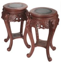 Jardiniere stands. A Pair of Craved Oriental Jardiniere Stands.