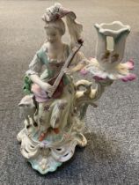 Candlestand. An 18th century rococo porcelain candlestand probably Derby