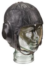 Flying Helmet. A WWII Luftwaffe LKp W101 brown leather flying helmet by H. Kopfhaube Gr