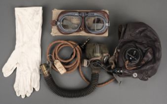 Aviation Apparel. WWII RAF-issue flying helmet, goggles and mask ensemble, circa 1940s