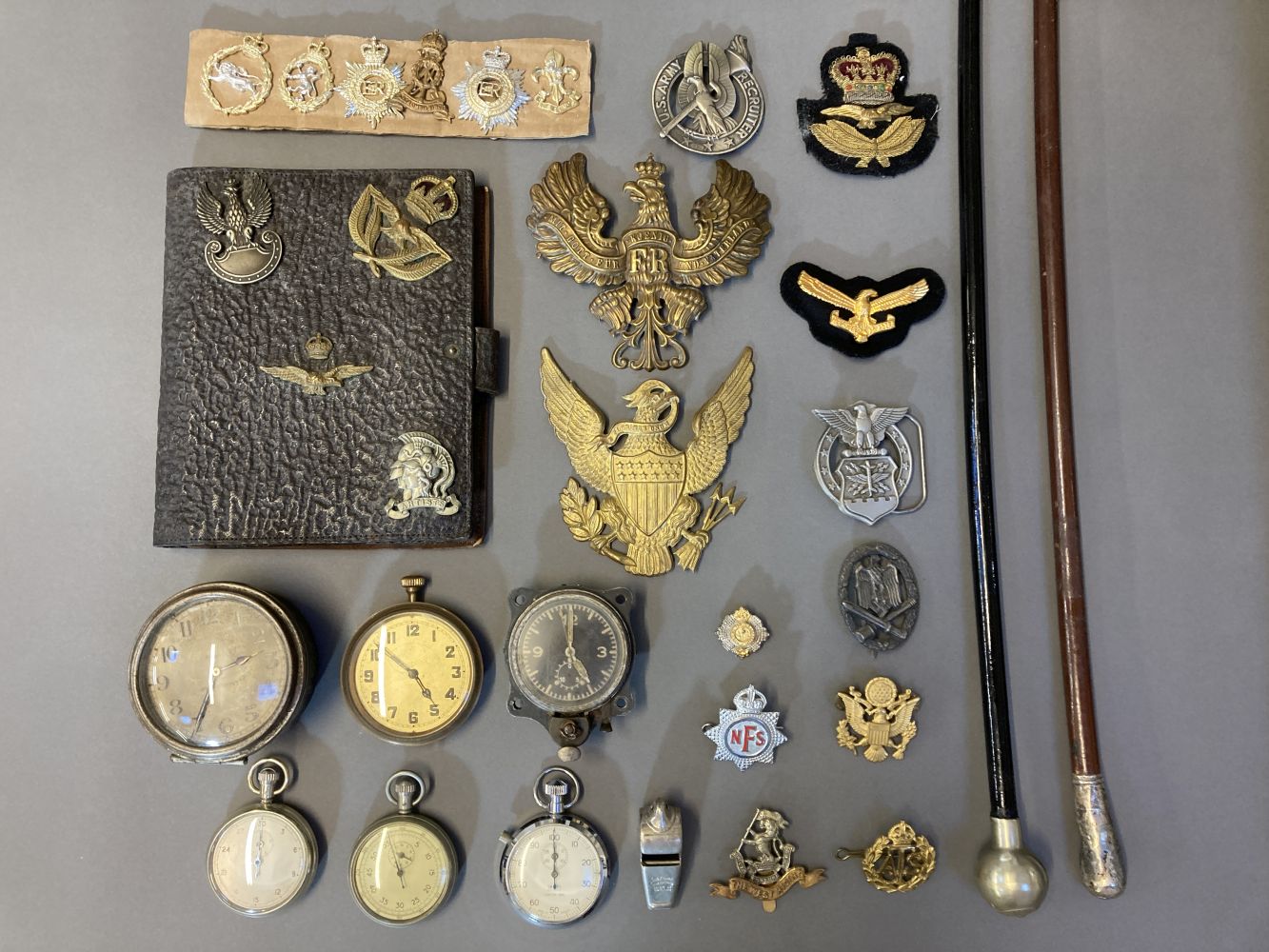 Military Badges. A mixed collection of militaria