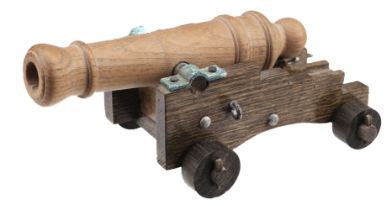 HMS Invincible. A wooden cannon made from the wood of HMS Invincible