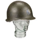 WWII American M1 steel helmet of the 29th Infantry Division, circa 1944