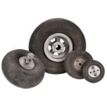 Aircraft wheels, probably WWII and later including a Spitfire or Hurricane tail wheel