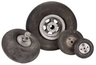 Aircraft wheels, probably WWII and later including a Spitfire or Hurricane tail wheel