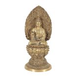 A POLISHED BRONZE FIGURE OF THE BODHISATTVA GUANYIN