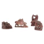 A GROUP OF FOUR CHINESE SOAPSTONE FIGURES