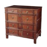 A CHARLES II STYLE OAK CHEST OF DRAWERS