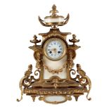 A 19TH CENTURY FRENCH ORMOLU AND ALABASTER MANTLE CLOCK