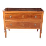 A CONTINENTAL WALNUT CHEST OF DRAWERS