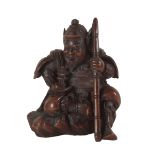 A JAPANESE CARVED WOOD NETSUKE