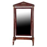 A LARGE EMPIRE FIGURED MAHOGANY AND GILT METAL MOUNTED CHEVAL MIRROR