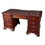 A GEORGE III STYLE MAHOGANY KNEEHOLE DESK