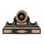 A 19TH CENTURY FRENCH BLACK AND VARIEGATED MARBLE MANTLE CLOCK