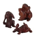 A GROUP OF THREE CARVED WOOD NETSUKE