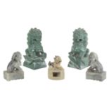 A GROUP OF FIVE CHINESE CARVED SOAPSTONE LION DOGS