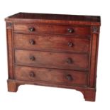 AN UNUSUAL REGENCY MAHOGANY 'PLUM-PUDDING' CHEST OF DRAWERS