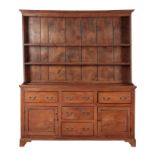 AN 18TH CENTURY PANELLED ELM DRESSER