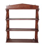 A REGENCY ROSEWOOD WALL MOUNTED BOOKCASE