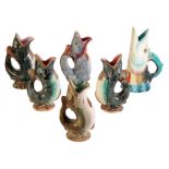 SIX VARIOUS MAJOLICA STYLE WATER JUGS