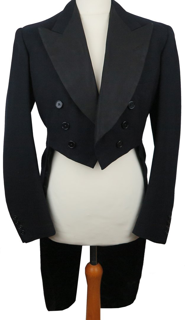 KILGOUR, FRENCH & STANBURY OF LONDON: A BLACK TAILCOAT