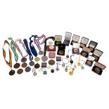 A COLLECTION OF VARIOUS ROWING MEDALS