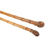 TWO EDWARDIAN BAMBOO OTTER HUNTING POLES