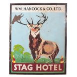 AN ENAMEL ADVERTISING SIGN FOR 'STAG HOTEL'