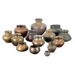 A LARGE COLLECTION OF PERSIAN AND NEAR EASTERN COPPER AND BRASS VASES
