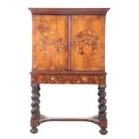 A WILLIAM AND MARY WALNUT AND MARQUETRY CABINET ON STAND