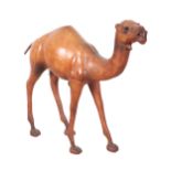 A LARGE LEATHER MODEL OF A CAMEL, AFTER LIBERTY OF LONDON