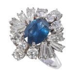 A SAPPHIRE & DIAMOND CLUSTER RING