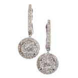 A PAIR OF DIAMOND CLUSTER EARRINGS