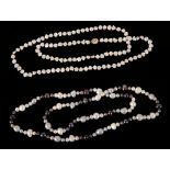 AN OPERA LENGTH CULTURED BAROQUE PEARL NECKLACE